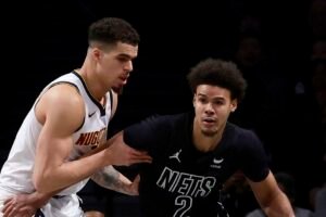 NBA známky za výmenu Michaela Portera Jr. za Cama Johnsona pre Nuggets a Nets.
