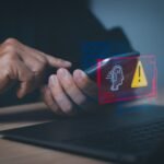 Users display warnings about the use of artificial intelligence (AI), access to malicious software or threats to online hackers. computer cyber security Warning concept or tech scam.